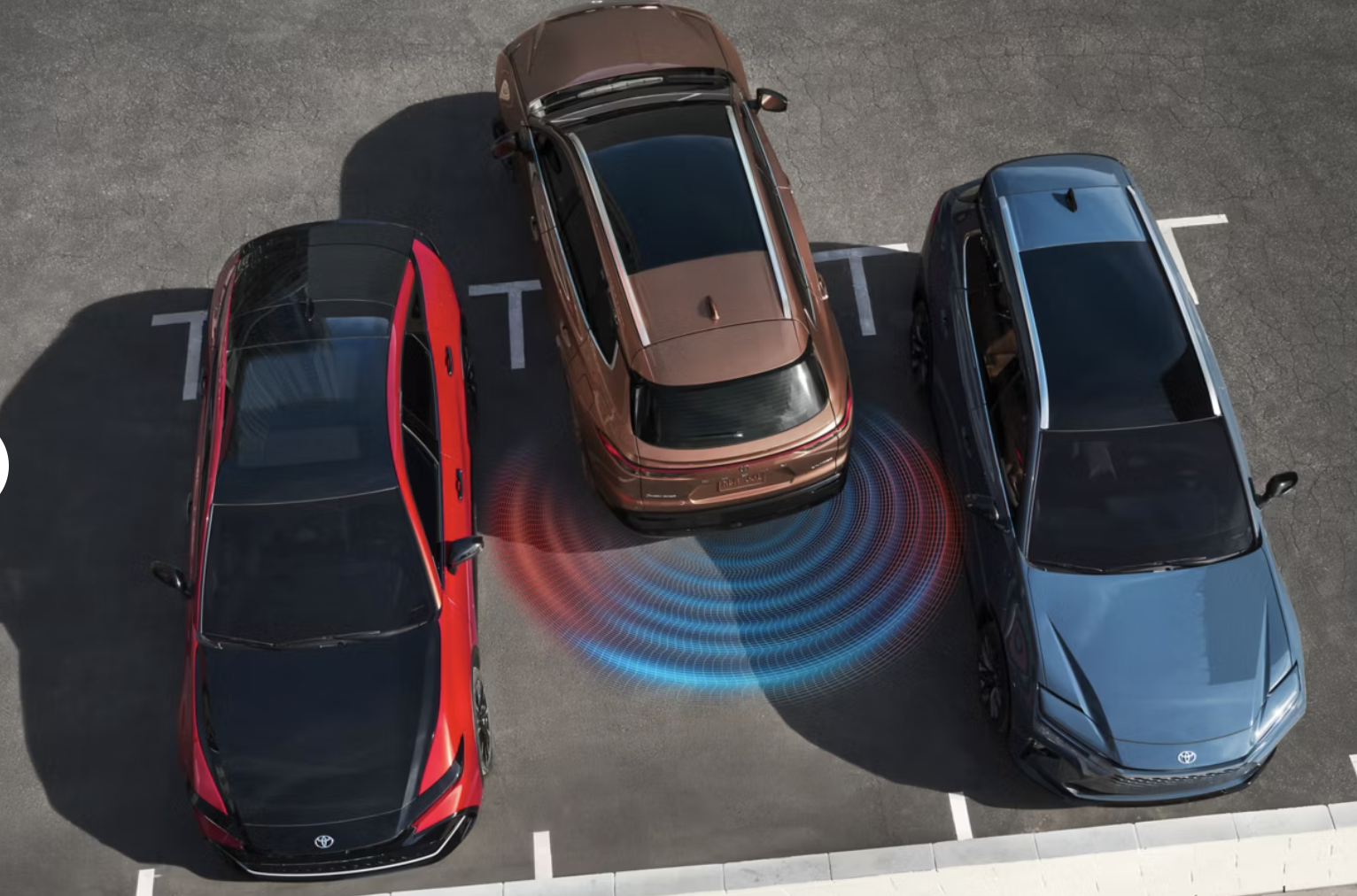 A Toyota signia backing out of a parking space