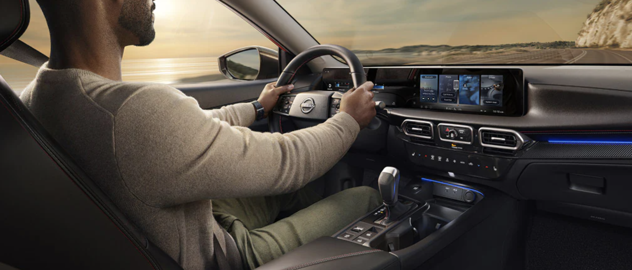 man driving a 2027 nissan sentra