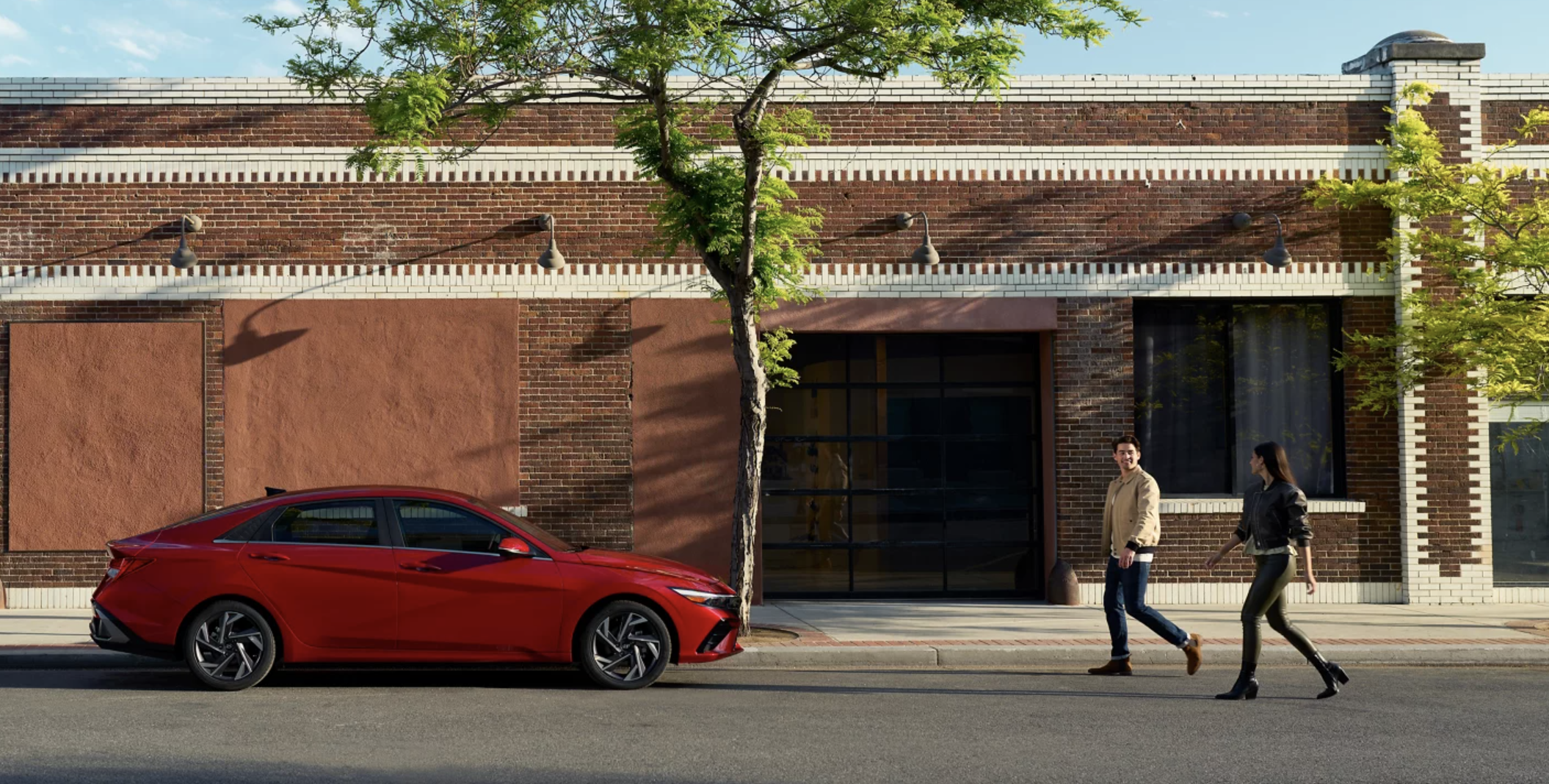 couple walking towards a new Hyundai Elantra in Bloomfield, NJ 