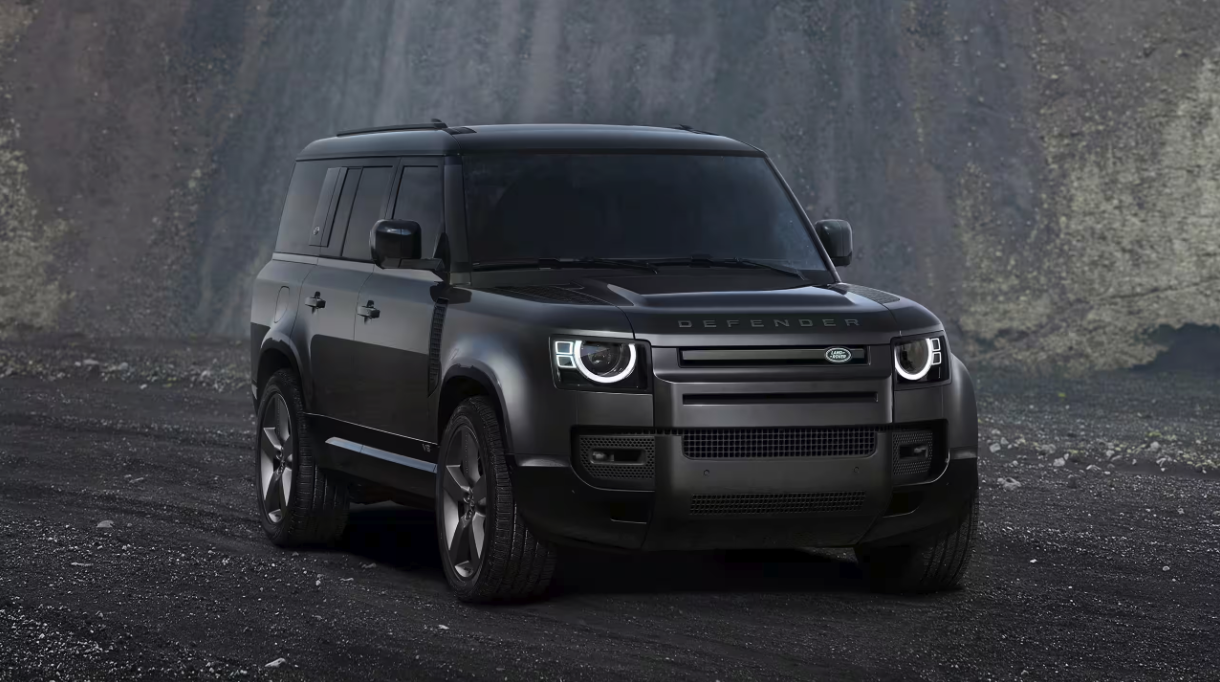 Front view of the 2024 Defender 130 on a dirt road