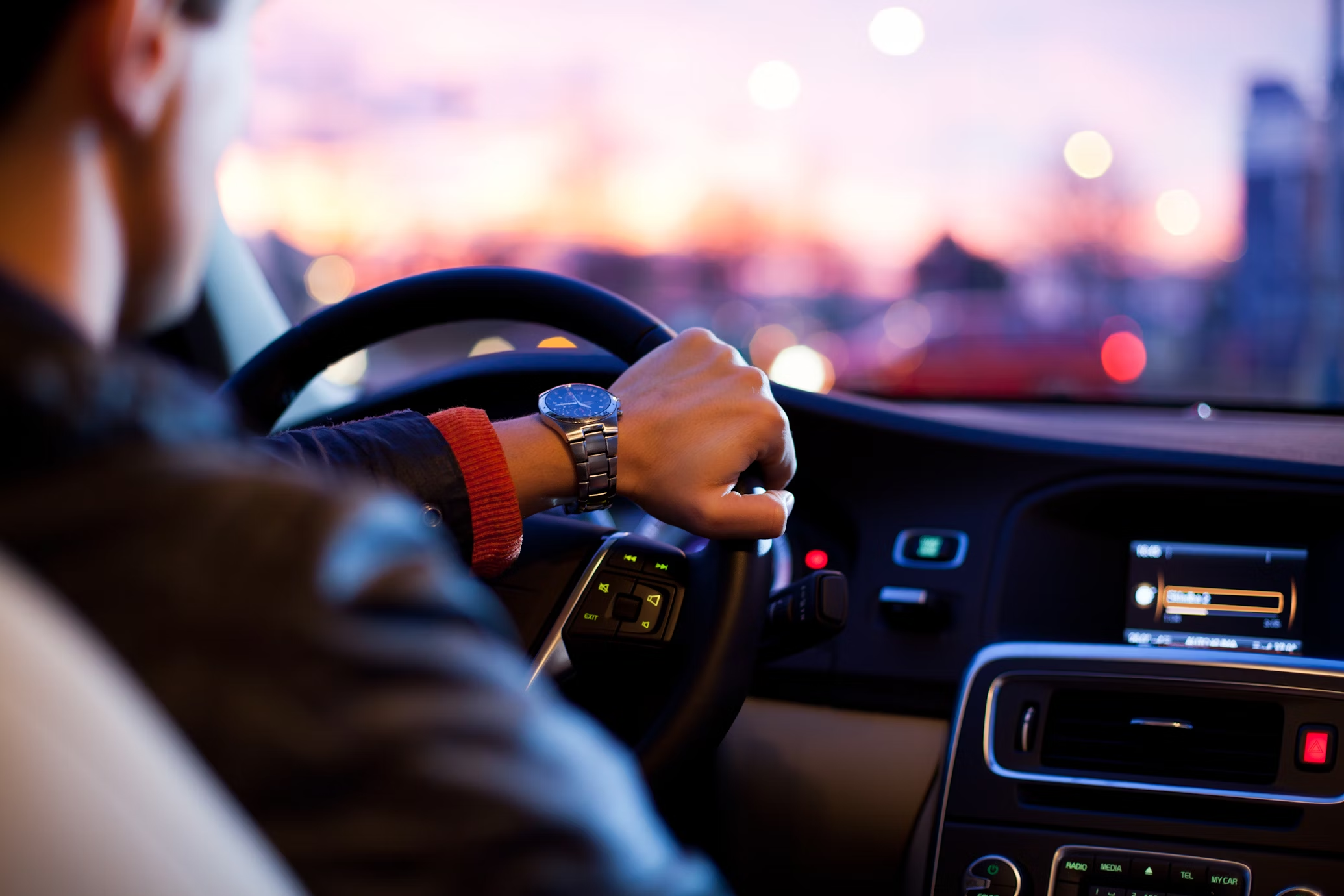 A guy driving a car